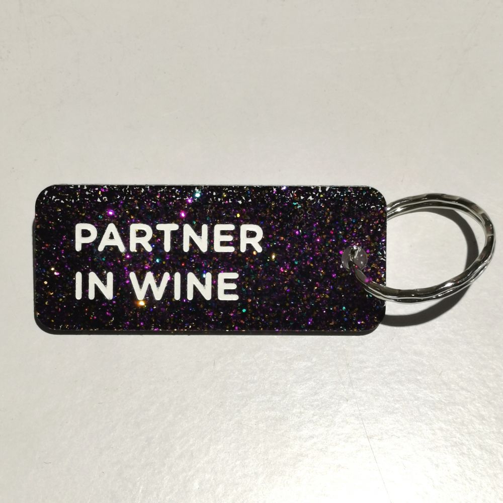 Porte-clés à paillettes - violet - Partner in wine