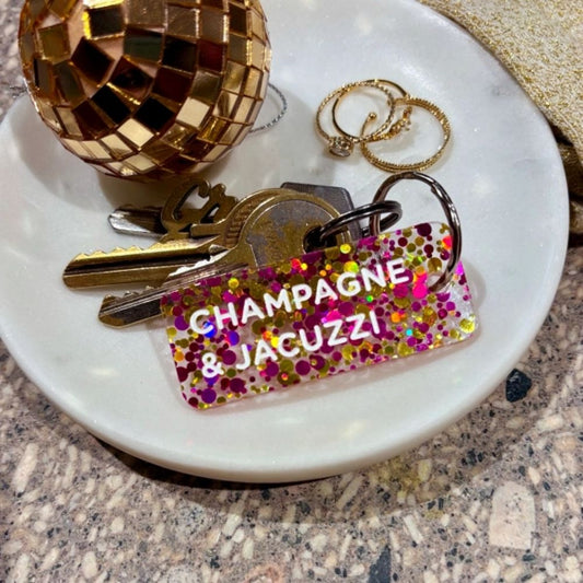 Porte-clés à paillettes - fuchsia or - Champagne & jacuzzi