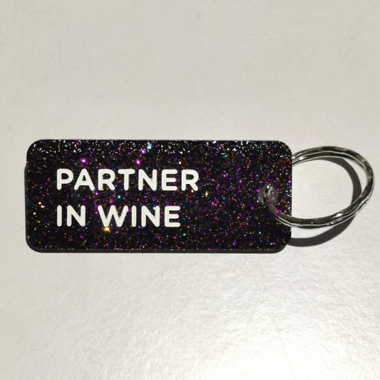 Porte-clés à paillettes - violet - Partner in wine